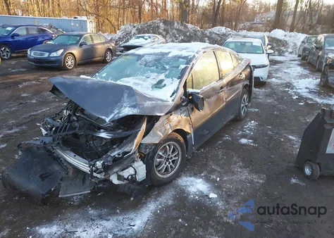 2018 Toyota Prius Prime Premium z USA, uszkodzony, nr VIN JTDKARFP6J3102921